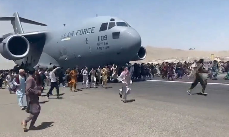 Afghans Try to Flee at Kabul Airport